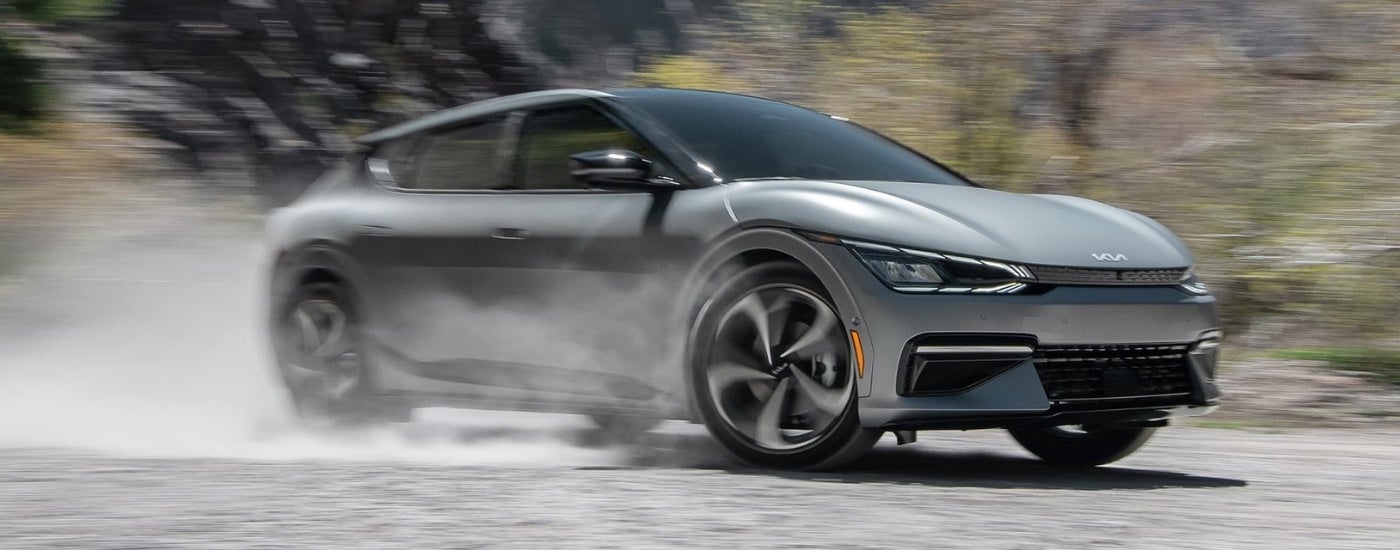 Grey 2023 Kia EV6 kicking up dust