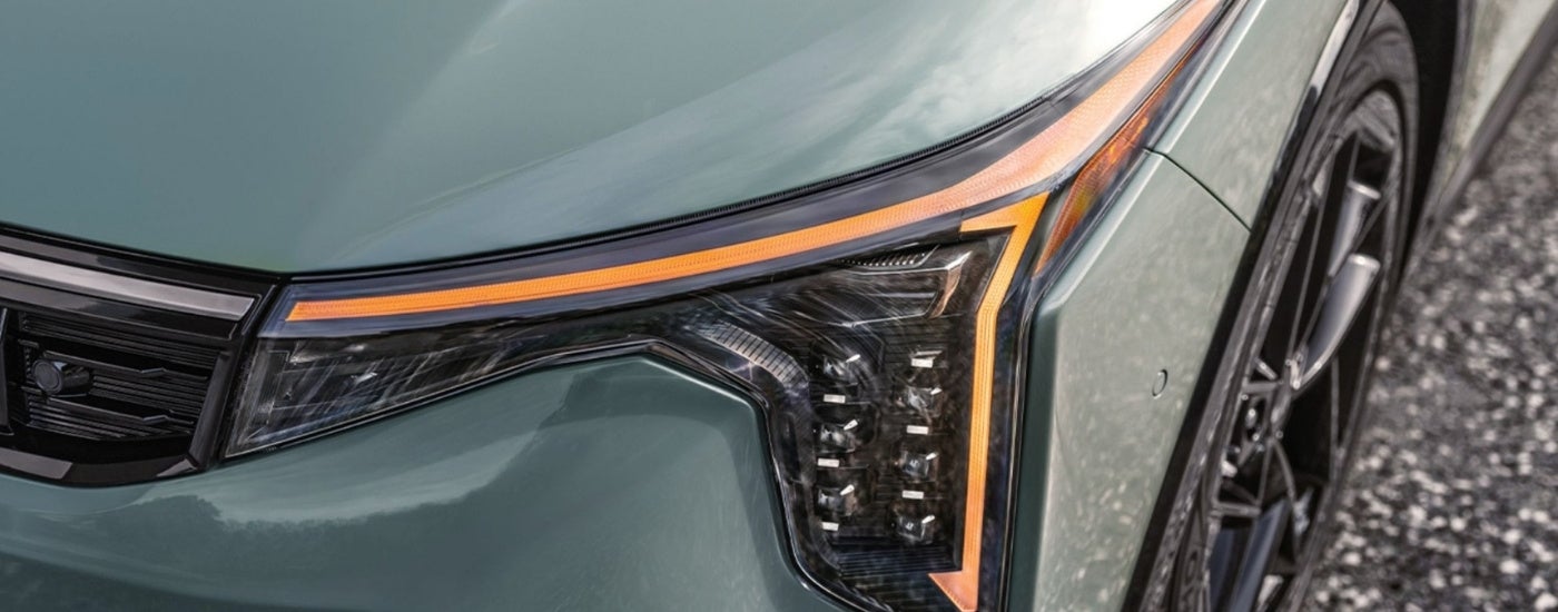 Driver side headlight on a green 2025 Kia K4