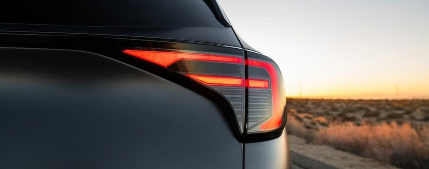 Rear tail light on a gray 2026 Kia Sportage.